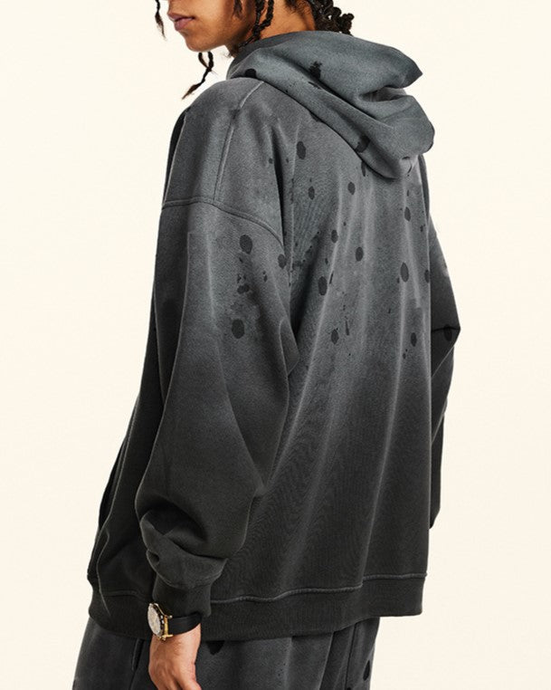 ダメージ加工のフード付きスウェットシャツ