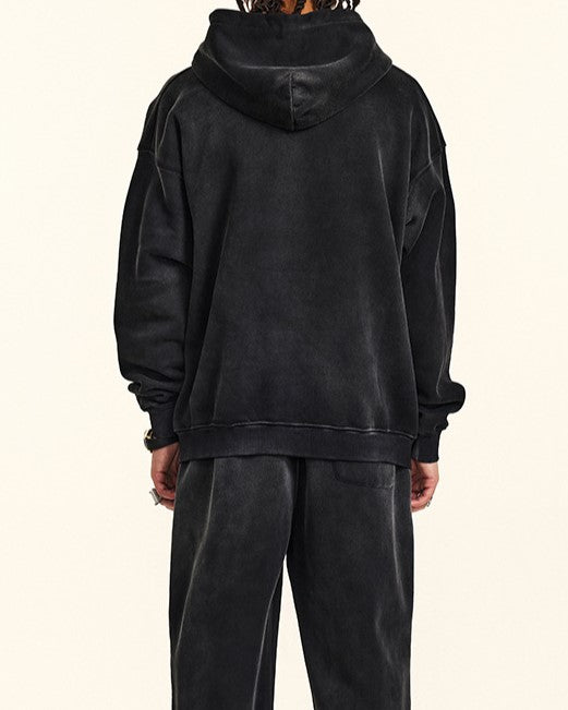 ダメージ加工のフード付きスウェットシャツ