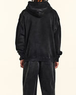 ダメージ加工のフード付きスウェットシャツ