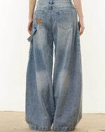 ボタン刺繍ジーンズ