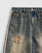 カラーブロックの破れたデニムショートパンツ