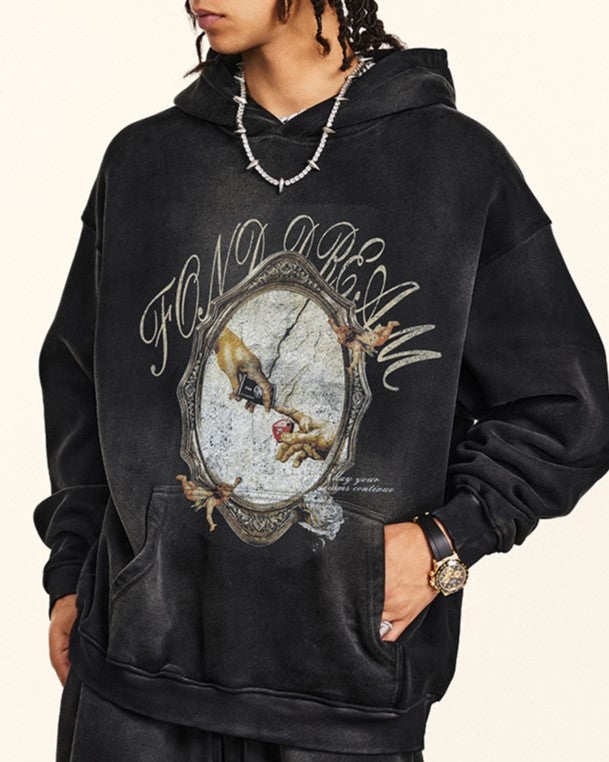 ダメージ加工のフード付きスウェットシャツ