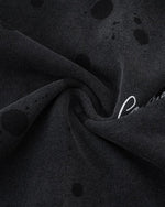 ダメージ加工のフード付きスウェットシャツ