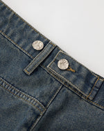 Distressed washed jeans