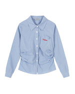 チェック柄の長袖シャツ