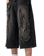 Distressed washed jeans