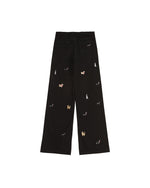 Washed distressed cartoon denim trousers
