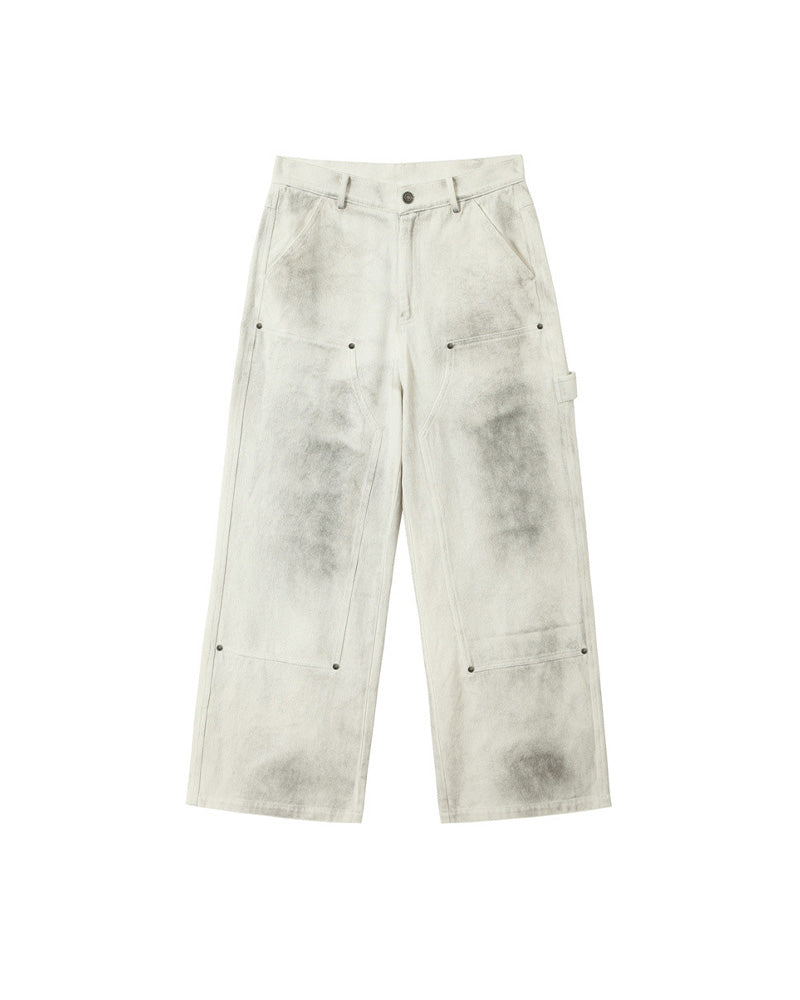 Distressed denim trousers