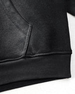 ダメージ加工のフード付きスウェットシャツ