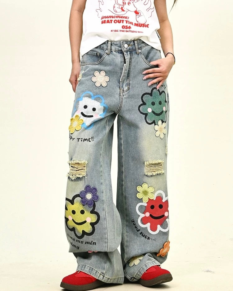 Distressed denim trousers
