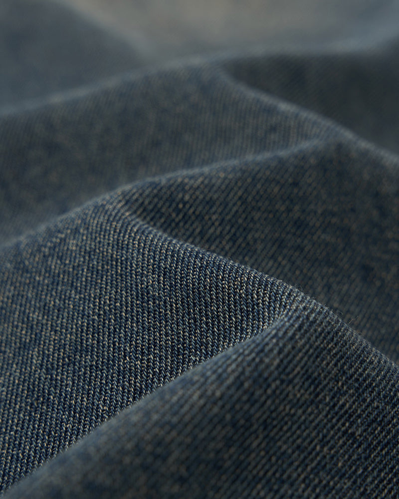 Distressed washed jeans