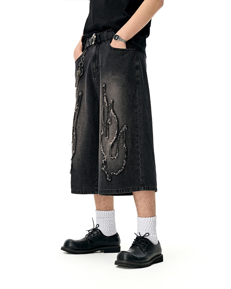 Distressed washed jeans