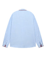 楽しいチェック柄の長袖シャツ