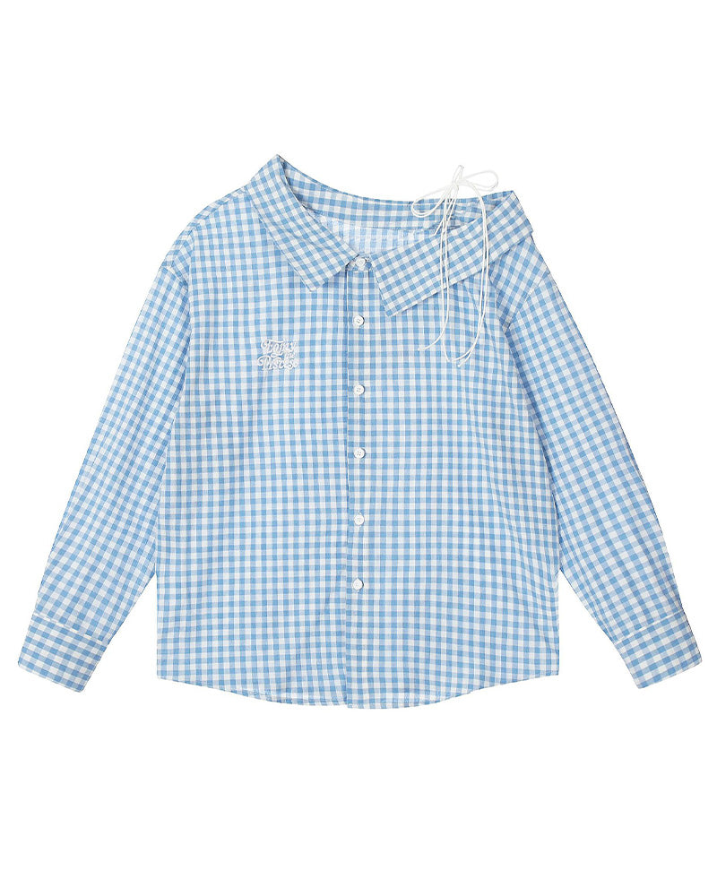 チェック柄のゆったりとした長袖シャツ