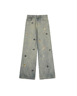 Washed distressed cartoon denim trousers