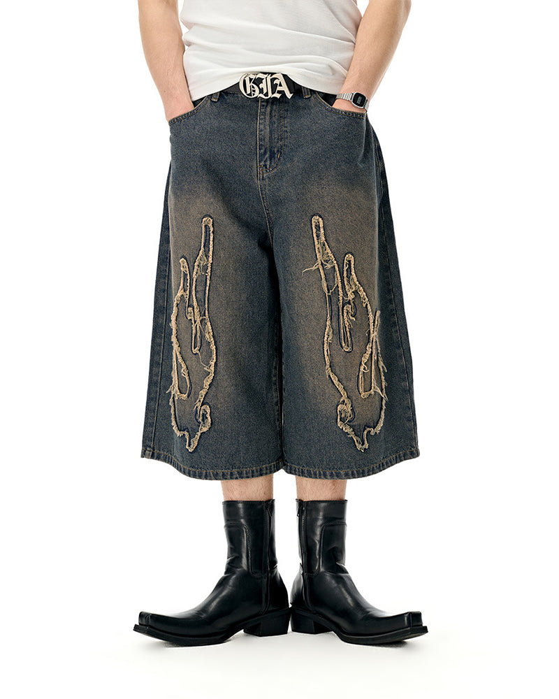 Distressed washed jeans