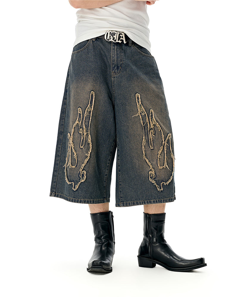 Distressed washed jeans