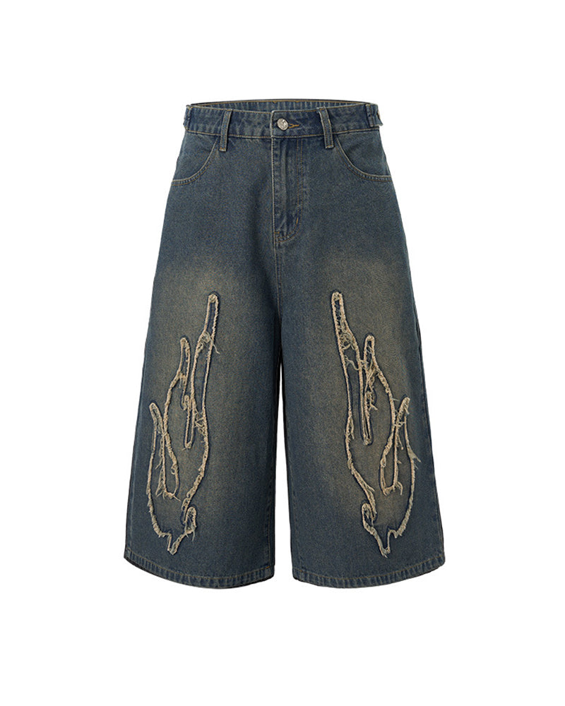 Distressed washed jeans