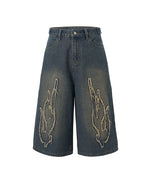 Distressed washed jeans