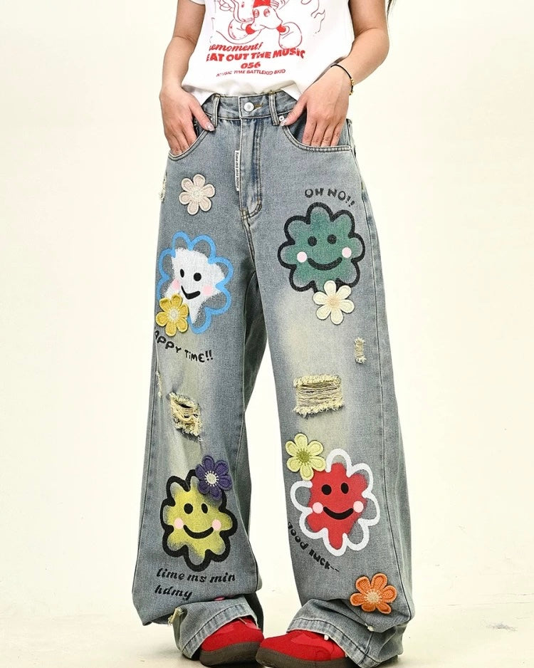 Distressed denim trousers