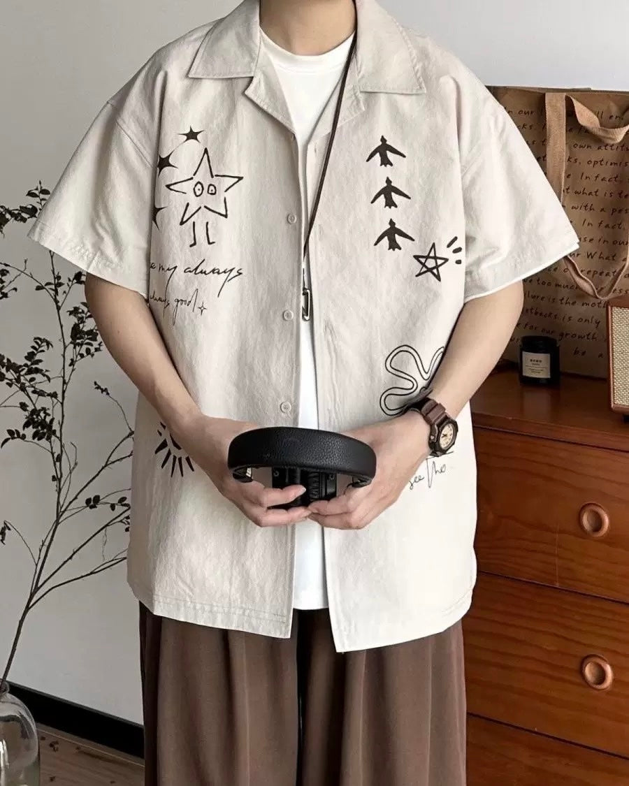 楽しいイラストが描かれた半袖シャツ