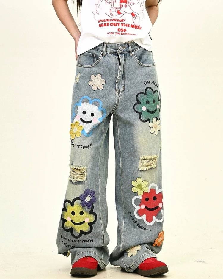 Distressed denim trousers