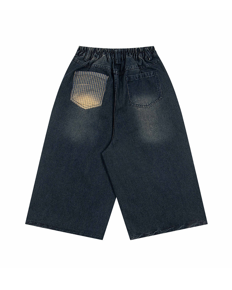 漫画の刺繍が入ったデニムショートパンツ