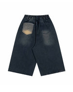 漫画の刺繍が入ったデニムショートパンツ