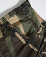 Washed ripped camouflage overalls