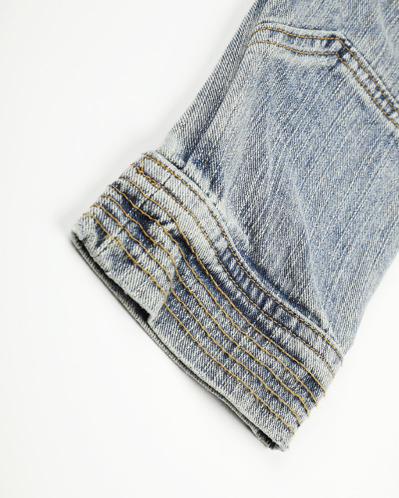 Distressed denim jacket