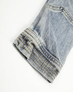 Distressed denim jacket