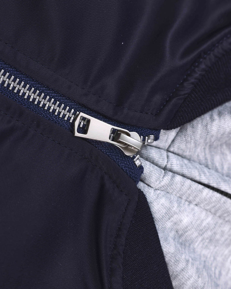 Faux-layered hooded jacket with paneling