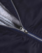 Faux-layered hooded jacket with paneling