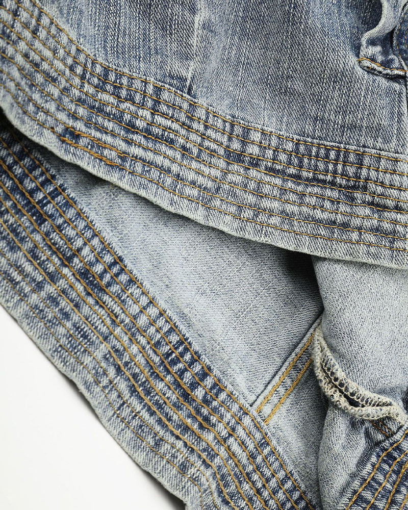Distressed denim jacket