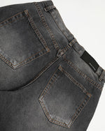 Distressed versatile trousers