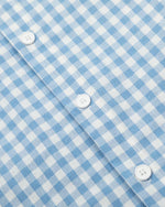 チェック柄のゆったりとした長袖シャツ