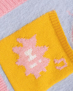 漫画風のゆったりカーディガンセーター