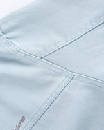 カジュアルなダメージ加工のカラーブロックジャケット