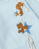 漫画風のゆったりとしたプルオーバーセーター