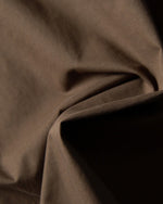 コントラストカラーステッチのフェイクツーピースシャツ