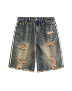 カラーブロックの破れたデニムショートパンツ