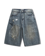 インクが飛び散ったデニムのクロップドパンツ