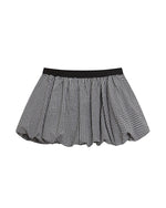 個性的な花のつぼみ柄スカート