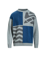 レトロなケーブルニットのイレギュラーセーター