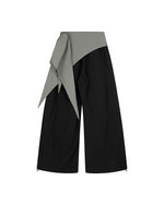 コントラストカラーのカジュアルステートメントパンツ