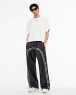 380G Batik-print zip-up trousers