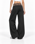 Leopard-print panel trousers