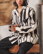 デザイナーの長袖シャツ