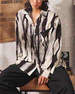 デザイナーの長袖シャツ