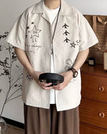 楽しいイラストが描かれた半袖シャツ